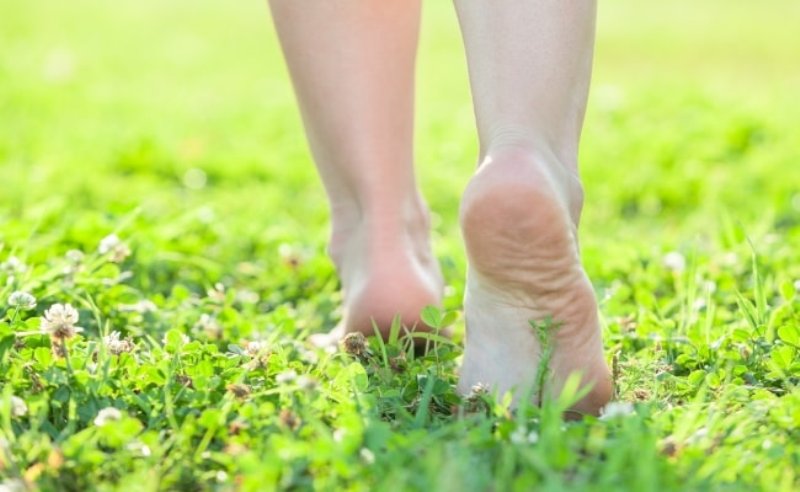 Walking barefoot on grass